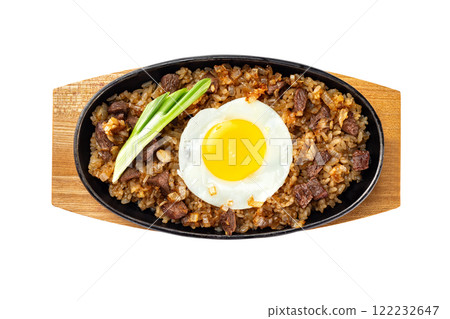 Top view image of pan with fried beef and rice served with egg and green onion at wooden board isolated at white background. Top view image of pan with fried beef and rice served with egg and green onion at wooden board isolated at white background. 122232647