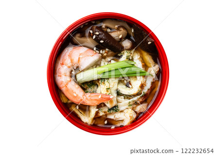 Closeup bowl of asian ebi soup with mushrrooms and seafood isolated at white background. Closeup bowl of asian ebi soup with mushrrooms and seafood isolated at white background. 122232654