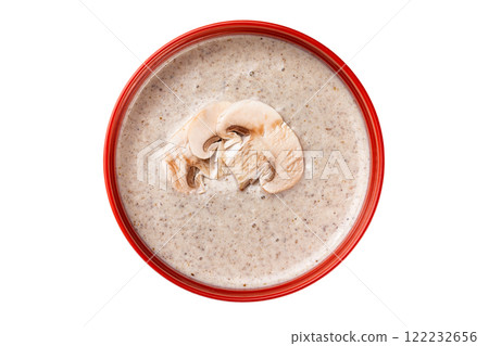 Closeup top view image of mushrooms cream soup isolated at white background. Closeup top view image of mushrooms cream soup isolated at white background. 122232656