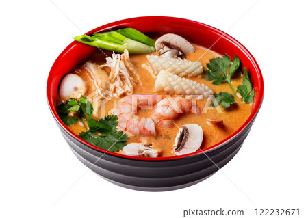 Bowl of thai tom yum soup isolated at white background. Bowl of thai tom yum soup isolated at white background. 122232671