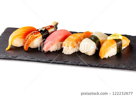 Set of japanese traditional sushi at stone plate isolated at white background. 122232677