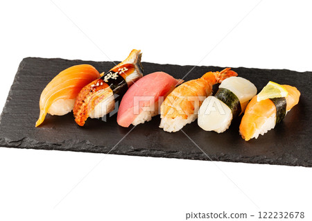 Set of japanese traditional sushi at stone plate isolated at white background. 122232678