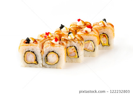 Japanese sushi rolls with crab, shrimps and cream cheese decorated with masago caviar and teriyaki sauce isolated at white background. Japanese sushi rolls with crab, shrimps and cream cheese decorated with masago caviar and teriyaki sauce isolated at white background. 122232803