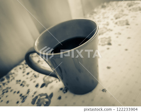 Red cup of coffee on grandmas table. Angra dos Reis. Red cup of coffee on grandmas table. Angra dos Reis. 122233904
