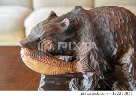Folk craft wooden carving of bear 122233935