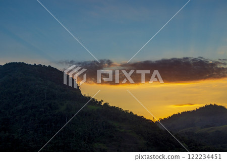 Beautiful colorful sunrise over the mountains Angra dos Reis Brazil. 122234451
