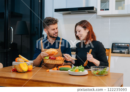 Couple Prepares Healthy Meals with Fresh Vegetables and Fruits. 122235093