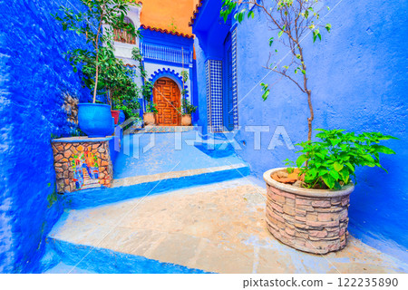 Chefchaouen, Morocco. Blue medina, ancient city, colourful flowerpots. 122235890
