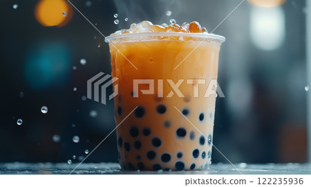 Iced Milk Tea with Tapioca Pearls in a Plastic Cup 122235936