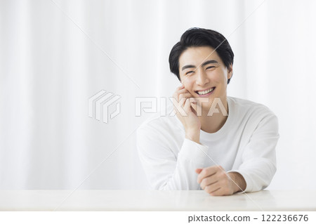 Thinking young man 122236676