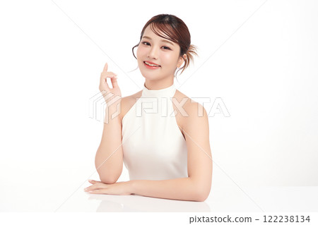 Beautiful young asian woman with clean fresh skin on white background, Face care, Facial treatment, Cosmetology, beauty and spa, Asian women portrait. Beautiful young asian woman with clean fresh skin on white background, Face care, Facial treatment, Cosmetology, beauty and spa, Asian women portrait. 122238134