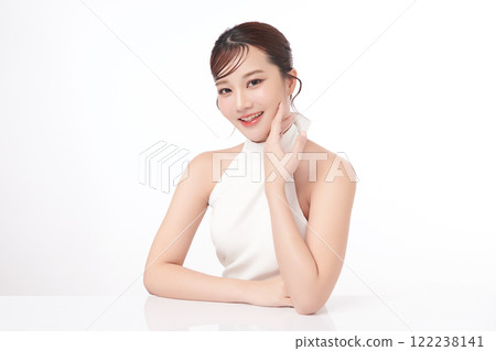 Beautiful young asian woman with clean fresh skin on white background, Face care, Facial treatment, Cosmetology, beauty and spa, Asian women portrait. Beautiful young asian woman with clean fresh skin on white background, Face care, Facial treatment, Cosmetology, beauty and spa, Asian women portrait. 122238141