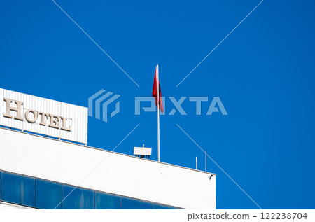 The Intercontinental hotel with Albanian flag at the Skanderbeg square, Tirana, Albania 122238704