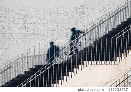 Shadows of people walking down stairs, Tirana, Albania 122238757