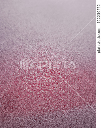 Frozen red surface covered with sparkling ice crystals in winter Frozen red surface covered with sparkling ice crystals in winter 122239732