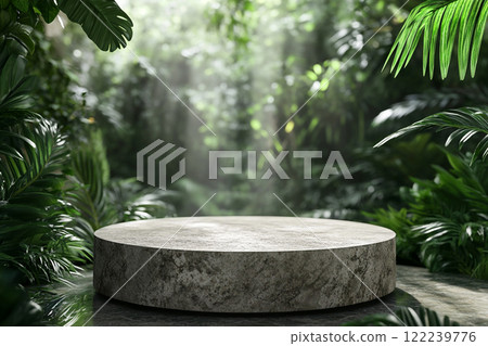 A circular stone platform is surrounded by lush, dense tropical foliage with various green leaves and some pink flowers, set in a misty, jungle-like environment. A circular stone platform is surrounded by lush, dense tropical foliage with various green leaves and some pink flowers, set in a misty, jungle-like environment. 122239776