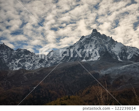 Majestic snow capped peaks Mont Blanc rising above chamonix valley in autumn 122239814