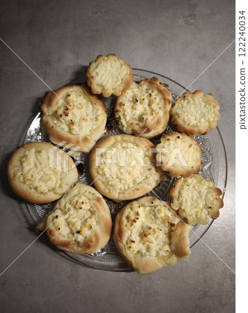 Delicious homemade pastries with cottage cheese filling on glass plate copy space Delicious homemade pastries with cottage cheese filling on glass plate copy space 122240034