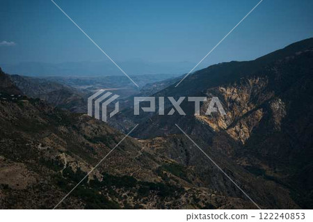 a view of the mountain road, city and mountains from the funicular near Tatev Monastery a view of the mountain road, city and mountains from the funicular near Tatev Monastery 122240853