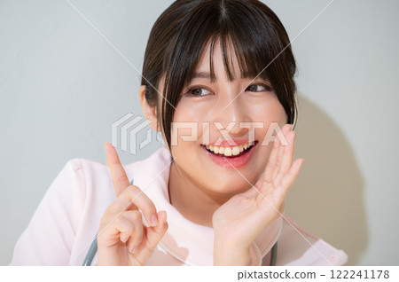 Whispering Japanese female staff 122241178