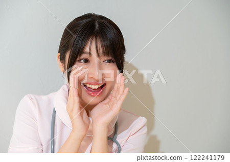 Whispering Japanese female staff 122241179