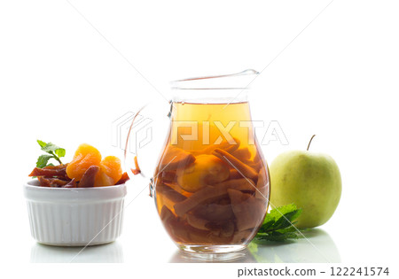 Traditional fruit drink on a wooden table, isolated on white background 122241574