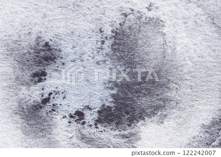 Abstract textured background with subtle monochrome brush strokes in a soft 122242007