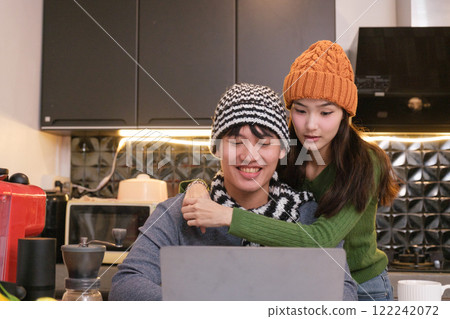 Young Asian couple living at home 122242072