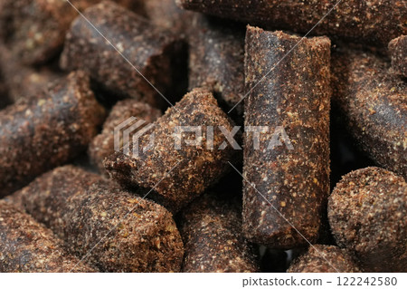 Close-Up of Brown Animal Dog Feed Pellets Close-Up of Brown Animal Dog Feed Pellets 122242580