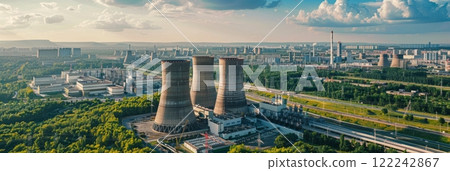 View from afar of a nuclear power plant, operating nuclear reactors against the backdrop of nature, peaceful atom, banner View from afar of a nuclear power plant, operating nuclear reactors against the backdrop of nature, peaceful atom, banner 122242867