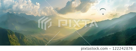 Happy paragliders flying on a paraglider, aerial view of flying paragliders, banner 122242876