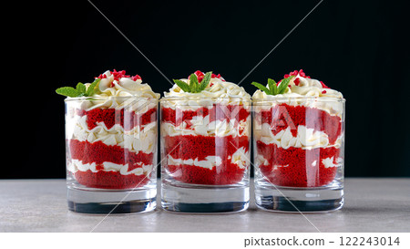 Delicious Red Velvet Dessert with Cream and Mint Delicious Red Velvet Dessert with Cream and Mint 122243014
