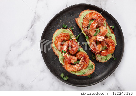 sandwiches with avocado and caramelized shrimp, micro-greens, breakfast, on a plate, top view, homemade, no people, 122243186