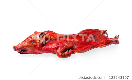 Baked, fried piglet on a wooden table, without people, on a white background 122243197