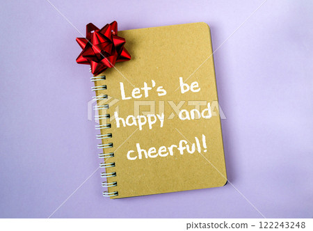 Spiral notebook with a red bow on top 122243248