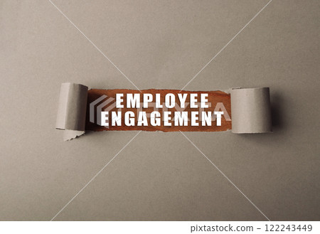 Brown ribbon with the words employee engagement on a dark background 122243449
