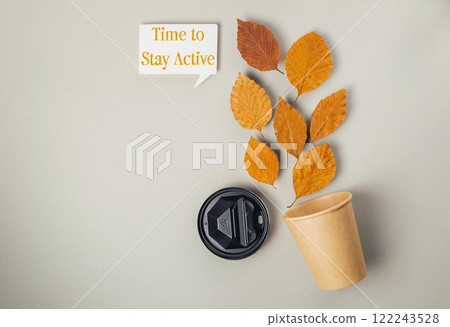 Coffee cup with a leaf on it Coffee cup with a leaf on it 122243528