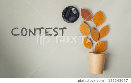 Autumn leaves with a camera lens and the word CONTEST 122243627