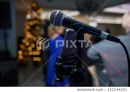 Make sure to arrange the microphone correctly in the event hall for speeches or performances 122244201
