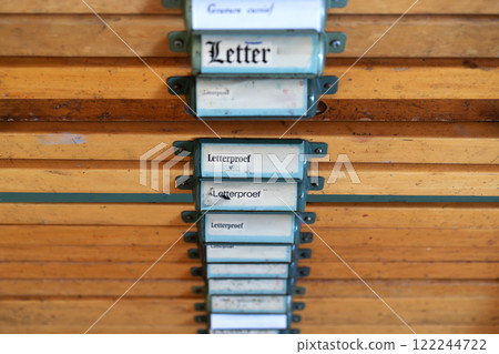 Closeup of vintage labeled compartments in drawer Closeup of vintage labeled compartments in drawer 122244722