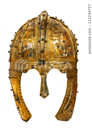 Golden medieval helmet with intricate design isolated on a white 122244757