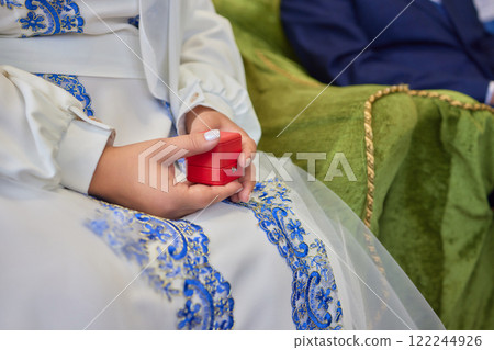 Cherished Engagement Moment with the Beautiful Ring Inside the Luxurious Red Box 122244926