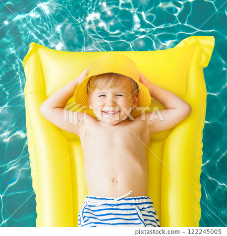 Happy child having fun on summer vacation 122245005