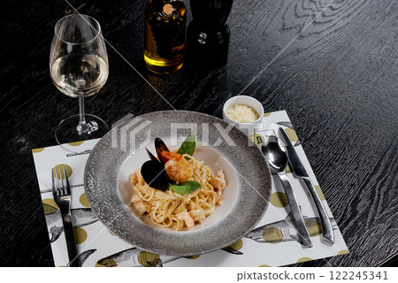Seafood Linguine with Creamy Sauce and Parmesan. Seafood Linguine with Creamy Sauce and Parmesan. 122245341