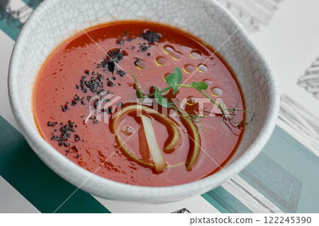 Fresh Tomato Soup with Herb Garnish. 122245390