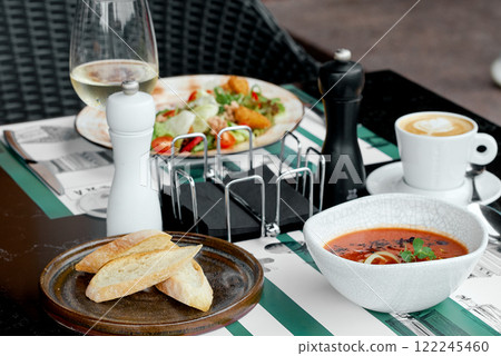 Table Setting with Bread, Soup, and Salad. Table Setting with Bread, Soup, and Salad. 122245460
