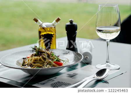 Gourmet Pesto Pasta with White Wine. 122245463
