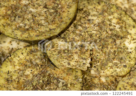 the flesh and seeds of sliced ripe eggplant 122245491