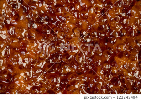 a delicacy of red salmon caviar during cooking 122245494