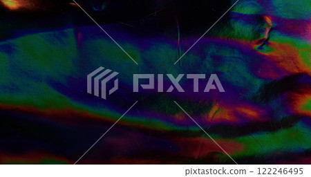 Dark gradient. Foil texture. Blurred colorful holographic flow. Wavy spectrum mesh flare. Illumination dimming background. Glossy rainbow surface. Dark gradient. Foil texture. Blurred colorful holographic flow. Wavy spectrum mesh flare. Illumination dimming background. Glossy rainbow surface. 122246495